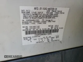 2011 Ford Taurus SE with VIN 1FAHP2DWXBG173095, listed as a Copart auction lot 89089415 with 136,305 mi miles and Clean Title. Bid and sale history available at DreamBid. Image 12.