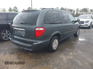 2006 Chrysler Town & Country LX with VIN 2A4GP44R96R615942, listed as a IAAI auction lot 42039452 with 158,009 mi miles and . Bid and sale history available at DreamBid. Image 4.