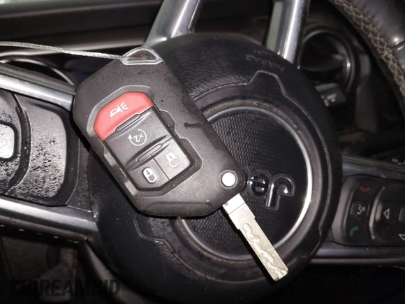 2019 Jeep Wrangler Unlimited Sahara with VIN 1C4HJXEG9KW656454, listed as a IAAI auction lot 41648236 with 75,403 mi miles and . Bid and sale history available at DreamBid. Image 11.