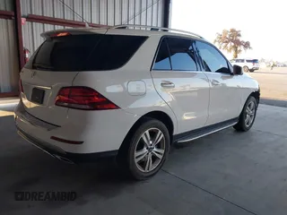 2016 Mercedes-Benz GLE 350 with VIN 4JGDA5JBXGA710342, listed as a IAAI auction lot 41012189 with 128,325 mi miles and . Bid and sale history available at DreamBid. Image 4.