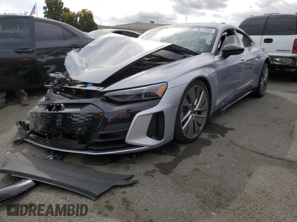 2022 Audi e-tron GT Prestige z VIN WAUEJBFW0N7006385, wystawiony jako Copart lot #70174293 z przebiegiem 24 376 mil mil oraz . Historia ofert i sprzedaży dostępna na DreamBid. Obrazek 1.