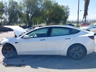 2023 Tesla Model 3 with VIN 5YJ3E1EA4PF462627, listed as a IAAI auction lot 41750103 with 38,463 mi miles and . Bid and sale history available at carsss.com. Image 14.