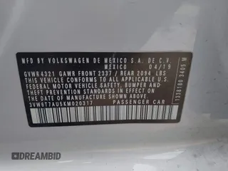 2019 Volkswagen GTI S z VIN 3VW6T7AU5KM020317, wystawiony jako IAAI lot #41790449 z przebiegiem 71 195 mil mil oraz . Historia ofert i sprzedaży dostępna na DreamBid. Obrazek 9.