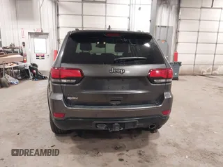 2016 Jeep Grand Cherokee Limited 75th Anniversary with VIN 1C4RJFBG2GC349154, listed as a IAAI auction lot 41392239 with 135,627 mi miles and . Bid and sale history available at DreamBid. Image 16.