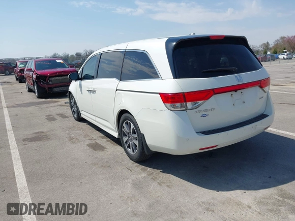 2016 Honda Odyssey Touring Elite with VIN 5FNRL5H97GB044278, listed as a IAAI auction lot 42056101 with 182,396 mi miles and . Bid and sale history available at DreamBid. Image 3.