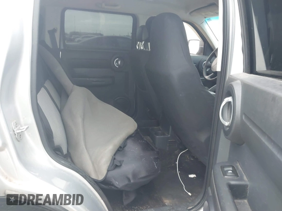 2010 Dodge Nitro SE with VIN 1D4PT2GK8AW144406, listed as a IAAI auction lot 41590691 with 165,959 mi miles and . Bid and sale history available at DreamBid. Image 8.