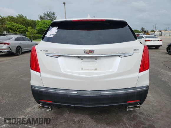 2018 Cadillac XT5 FWD with VIN 1GYKNARSXJZ153562, listed as a Copart auction lot 60137185 with 49,425 mi miles and Clean title. Bid and sale history available at DreamBid. Image 6.