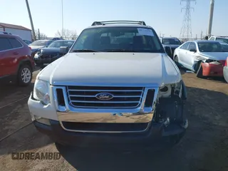 2010 Ford Explorer Sport Trac XLT z VIN 1FMEU3BE4AUA31407, wystawiony jako IAAI lot #41771678 z przebiegiem 105 988 mil mil oraz . Historia ofert i sprzedaży dostępna na DreamBid. Obrazek 12.
