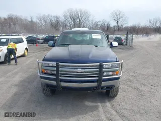 1999 Chevrolet Silverado 1500 LT with VIN 1GCEK19T3XE123498, listed as a IAAI auction lot 41801019 with 213,646 mi miles. Bid and sale history available at carsss.com. Image 13.
