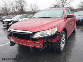 2010 Ford Taurus SEL with VIN 1FAHP2EW2AG103135, listed as a IAAI auction lot 41789927 with 129,353 mi miles. Bid and sale history available at carsss.com. Image 2.