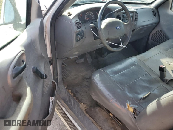 2003 Ford F-150 XL with VIN 1FTRF17W03NA39409, listed as a Copart auction lot 78578434 with 142,299 mi miles and Salvage Title. Bid and sale history available at DreamBid. Image 8.
