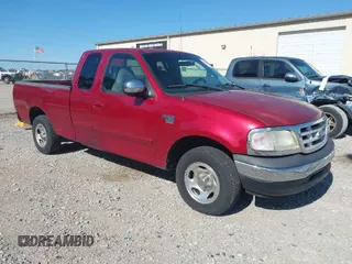 1999 Ford F-150 with VIN 1FTRX17W3XNC21513, listed as a IAAI auction lot 42036130 with 242,557 mi miles and . Bid and sale history available at DreamBid. Image 1.
