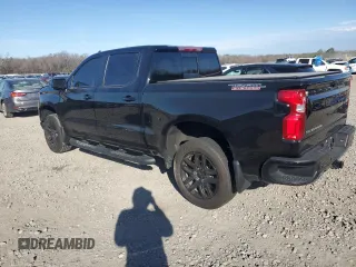 2023 Chevrolet Silverado 1500 LT Trail Boss with VIN 3GCUDFE84PG273892, listed as a Copart auction lot 46909745 with 59,466 mi miles and Salvage Title. Bid and sale history available at DreamBid. Image 2.
