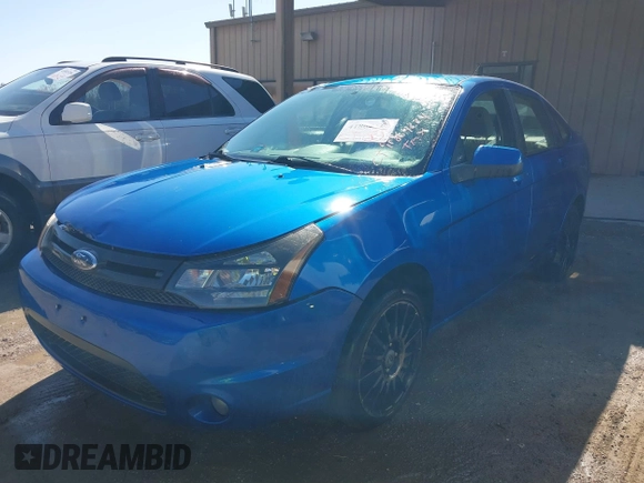 2010 Ford Focus SES with VIN 1FAHP3GN8AW165221, listed as a IAAI auction lot 41864224 with 148,785 mi miles. Bid and sale history available at carsss.com. Image 2.