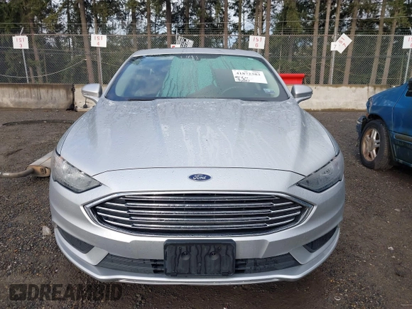 2017 Ford Fusion SE z VIN 3FA6P0HD2HR149699, wystawiony jako IAAI lot #41872383 z przebiegiem 95 587 mil mil oraz . Historia ofert i sprzedaży dostępna na DreamBid. Obrazek 13.