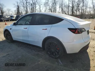 2020 Tesla Model Y Long Range with VIN 5YJYGDEE2LF041925, listed as a Copart auction lot 47092675 with 75,871 mi miles and Salvage Title. Bid and sale history available at DreamBid. Image 2.