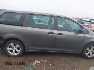 2015 Toyota Sienna L with VIN 5TDZK3DC9FS563593, listed as a IAAI auction lot 41466419 with 136,394 mi miles and . Bid and sale history available at DreamBid. Image 13.