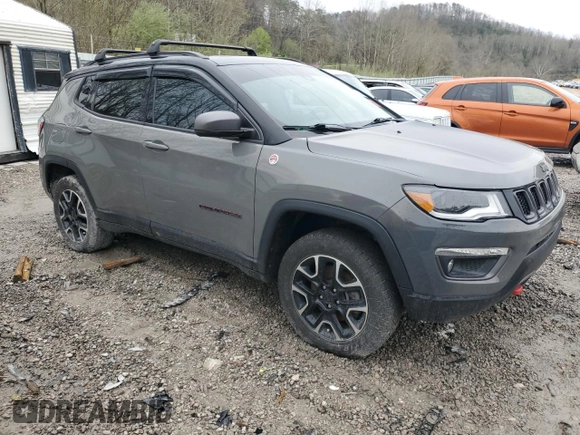2021 Jeep Compass Trailhawk with VIN 3C4NJDDB2MT566157, listed as a Copart auction lot 51652255 with 47,284 mi miles and Salvage title. Bid and sale history available at DreamBid. Image 4.