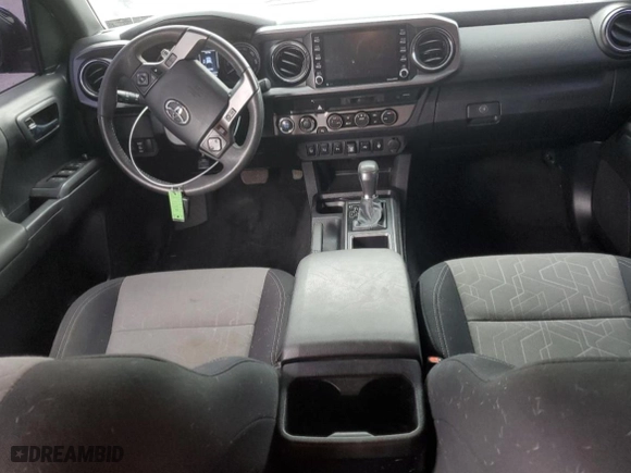 2023 Toyota Tacoma 4WD SR with VIN 3TMCZ5AN0PM582974, listed as a Copart auction lot 48390905 with 26,916 mi miles and Salvage Title. Bid and sale history available at carsss.com. Image 8.