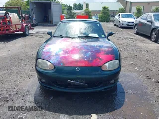 1999 Mazda MX-5 Miata z VIN JM1NB3537X0123440, wystawiony jako IAAI lot #42263294 z przebiegiem 107 356 mil mil oraz . Historia ofert i sprzedaży dostępna na DreamBid. Obrazek 12.