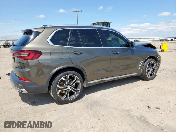 2023 BMW X5 xDrive40i with VIN 5UXCR6C01P9P27041, listed as a Copart auction lot 59009585 with 45,568 mi miles and Salvage title. Bid and sale history available at DreamBid. Image 3.