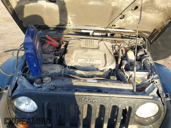 2013 Jeep Wrangler Sahara with VIN 1C4AJWBG8DL565227, listed as a IAAI auction lot 41987087 with 90,644 mi miles and . Bid and sale history available at DreamBid. Image 10.