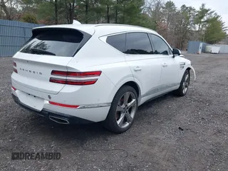 2023 Genesis GV80 z VIN KMUHBDSB8PU140123, wystawiony jako IAAI lot #41692036 z przebiegiem 37 021 mil mil oraz . Historia ofert i sprzedaży dostępna na DreamBid. Obrazek 4.