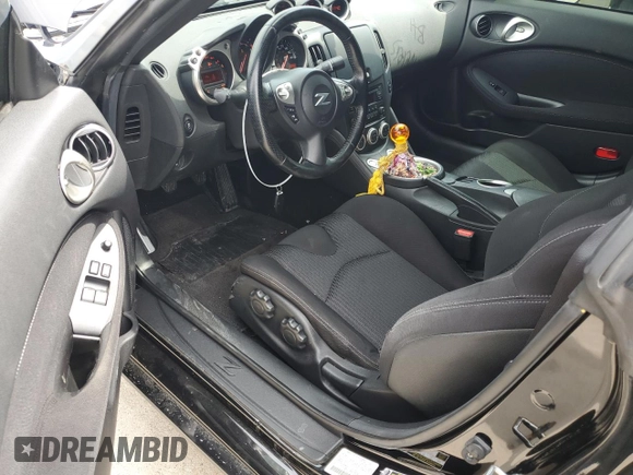 2016 Nissan 370Z with VIN JN1AZ4EH8GM936468, listed as a Copart auction lot 54618544 with 60,868 mi miles and Salvage Title. Bid and sale history available at carsss.com. Image 8.