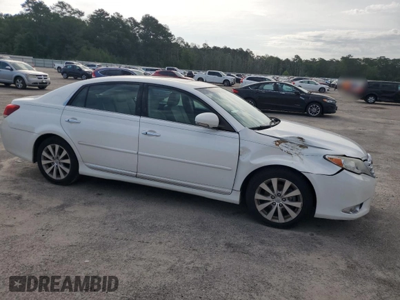 2011 Toyota Avalon with VIN 4T1BK3DB5BU390570, listed as a Copart auction lot 60098705 with 152,969 mi miles and Salvage title. Bid and sale history available at DreamBid. Image 4.