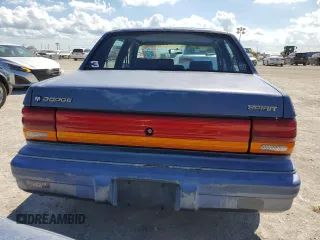 1993 Dodge Spirit z VIN 1B3XA46K0PF638477, wystawiony jako Copart lot #75710534 z przebiegiem 50 637 mil mil oraz Szkody całkowita. Historia ofert i sprzedaży dostępna na DreamBid. Obrazek 6.