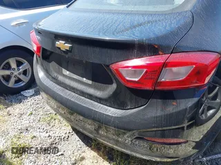 2018 Chevrolet Cruze LS with VIN 1G1BC5SM0J7156859, listed as a IAAI auction lot 42204288 with 60,305 mi miles and . Bid and sale history available at DreamBid. Image 16.
