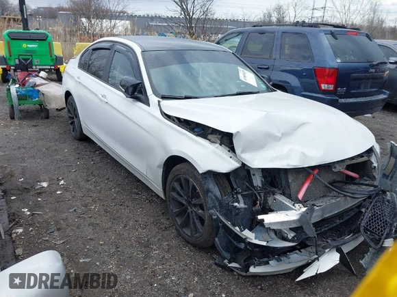 2018 BMW 3 Series 320i xDrive with VIN WBA8E5G52JNU46803, listed as a IAAI auction lot 41869625 with 67,057 mi miles. Bid and sale history available at carsss.com. Image 1.