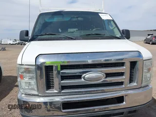 2014 Ford Econoline Cargo Commercial z VIN 1FTNE2EW6EDA19961, wystawiony jako IAAI lot #42370572 z przebiegiem 107 320 mil mil oraz . Historia ofert i sprzedaży dostępna na DreamBid. Obrazek 6.
