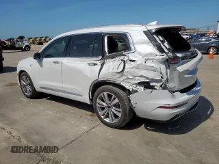 2024 Cadillac XT6 FWD Premium Luxury with VIN 1GYKPCRS7RZ711983, listed as a Copart auction lot 64842625 with 6,394 mi miles and Clean title. Bid and sale history available at DreamBid. Image 2.