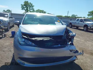 2021 Chrysler Voyager LXi z VIN 2C4RC1DG4MR568260, wystawiony jako IAAI lot #42187861 z przebiegiem Nie podano mil oraz . Historia ofert i sprzedaży dostępna na DreamBid. Obrazek 12.