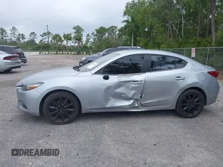 2017 Mazda 3 Touring with VIN 3MZBN1V76HM108148, listed as a IAAI auction lot 41911568 with 194,363 mi miles and . Bid and sale history available at DreamBid. Image 6.