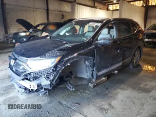 2020 Honda CR-V Touring z VIN 2HKRW2H90LH664990, wystawiony jako Copart lot #41452135 z przebiegiem Nie podano mil oraz Szkoda całkowita • Salvage title. Historia ofert i sprzedaży dostępna na DreamBid. Obrazek 1.