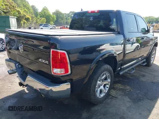 2016 Ram 1500 Laramie z VIN 1C6RR7NT4GS397534, wystawiony jako IAAI lot #42159199 z przebiegiem 120 322 mil mil oraz . Historia ofert i sprzedaży dostępna na DreamBid. Obrazek 4.