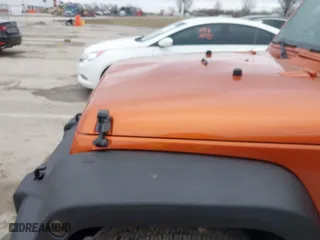 2011 Jeep Wrangler Sport with VIN 1J4AA2D16BL589390, listed as a IAAI auction lot 41478801 with 153,013 mi miles. Bid and sale history available at carsss.com. Image 20.