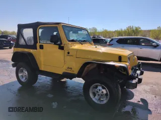 2004 Jeep Wrangler Sport z VIN 1J4FA49S64P751615, wystawiony jako Copart lot #55810895 z przebiegiem 128 165 mil mil oraz Szkoda całkowita • Salvage title. Historia ofert i sprzedaży dostępna na DreamBid. Obrazek 4.