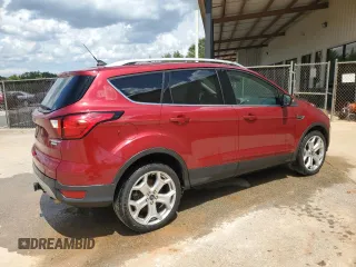 2019 Ford Escape Titanium z VIN 1FMCU0J97KUB20612, wystawiony jako Copart lot #64638415 z przebiegiem 100 102 mil mil oraz Czysty tytuł • Clean title. Historia ofert i sprzedaży dostępna na DreamBid. Obrazek 3.