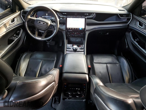 2023 Jeep Grand Cherokee Overland with VIN 1C4RJHDG8PC502208, listed as a Copart auction lot 86927734 with 53,732 mi miles and Salvage title. Bid and sale history available at DreamBid. Image 8.