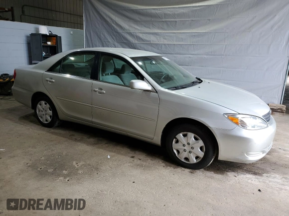 2003 Toyota Camry LE with VIN 4T1BE32K33U710903, listed as a Copart auction lot 56976585 with 157,444 mi miles and Clean Title. Bid and sale history available at DreamBid. Image 4.