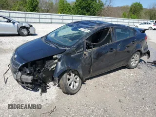 2014 Kia Rio EX z VIN KNADN4A31E6328144, wystawiony jako Copart lot #52235825 z przebiegiem 100 145 mil mil oraz Szkody całkowita. Historia ofert i sprzedaży dostępna na DreamBid. Obrazek 1.