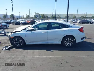 2018 Honda Civic EX with VIN 2HGFC2F71JH502564, listed as a IAAI auction lot 41933157 with 56,696 mi miles and . Bid and sale history available at DreamBid. Image 14.