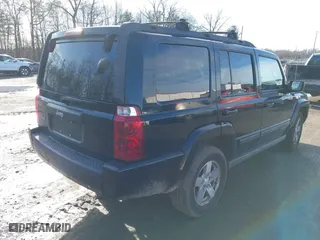 2007 Jeep Commander Sport with VIN 1J8HG48K97C566185, listed as a IAAI auction lot 41519140 with 127,230 mi miles. Bid and sale history available at carsss.com. Image 4.