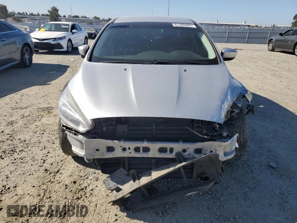2018 Ford Focus SE with VIN 1FADP3FE4JL308909, listed as a Copart auction lot 61489005 with 58,613 mi miles and Salvage title. Bid and sale history available at DreamBid. Image 5.