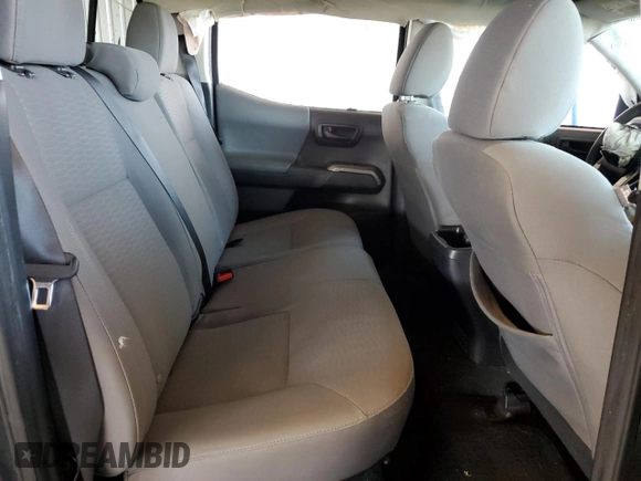 2018 Toyota Tacoma SR5 with VIN 3TMAZ5CN9JM075289, listed as a Copart auction lot 52409365 with 65,793 mi miles and Salvage Title. Bid and sale history available at DreamBid. Image 10.