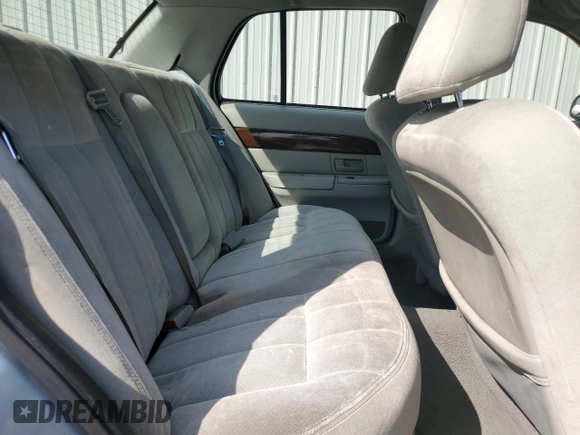 2004 Mercury Grand Marquis GS z VIN 2MEFM74W84X607050, wystawiony jako Copart lot #52303045 z przebiegiem 194 215 mil mil oraz Szkoda całkowita • Salvage title. Historia ofert i sprzedaży dostępna na DreamBid. Obrazek 10.