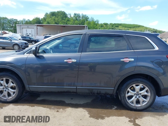 2014 Mazda CX-9 Touring with VIN JM3TB3CV9E0426767, listed as a IAAI auction lot 42301021 with 129,497 mi miles and . Bid and sale history available at DreamBid. Image 15.